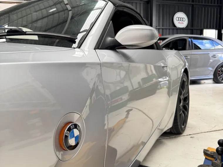 European car up on the hoist in the Checkpoint Motors workshop